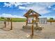 Dog park entrance featuring signage that directs dog owners to keep their dogs leashed for safety at 10301 Owens Cir, Broomfield, CO 80021
