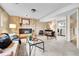 The living room features a brick fireplace and comfortable seating with plenty of space at 10301 Owens Cir, Broomfield, CO 80021