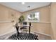 This office features a desk, zebra rug, and natural light creating a modern and functional space at 10301 Owens Cir, Broomfield, CO 80021