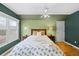 Guest bedroom with wood floors, and a ceiling fan at 982 Grant Pl, Boulder, CO 80302