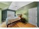 Guest bedroom with wood floors, and a ceiling fan at 982 Grant Pl, Boulder, CO 80302