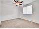 Bedroom with new carpet, white walls, and ceiling fan at 11535 Albion Ct, Thornton, CO 80233