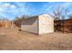 Convenient backyard storage shed with door, siding, and space for tools and outdoor equipment to keep your yard tidy at 11535 Albion Ct, Thornton, CO 80233