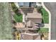 Aerial view of backyard including patio with furniture, lawn, and privacy fence at 4206 Eagle Ridge Way, Castle Rock, CO 80104