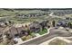 Home with an aerial view of lush landscaping, neighborhood, and well-maintained street at 4206 Eagle Ridge Way, Castle Rock, CO 80104