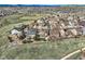An aerial view of a residential neighborhood with varied home styles and green spaces at 4206 Eagle Ridge Way, Castle Rock, CO 80104