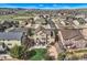 View of the backyard with a lawn, patio with seating, and white picket fence at 4206 Eagle Ridge Way, Castle Rock, CO 80104