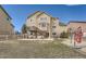 Spacious backyard featuring a deck, patio, and well-maintained lawn at 4206 Eagle Ridge Way, Castle Rock, CO 80104