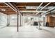 Unfinished basement with white walls, concrete floor, and exposed ceiling at 4206 Eagle Ridge Way, Castle Rock, CO 80104