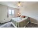 Bedroom with a cozy bed, soft carpet, and window, offering a relaxing retreat with natural light at 4206 Eagle Ridge Way, Castle Rock, CO 80104