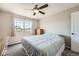 Bright bedroom with carpet, neutral walls, and a single bed with natural light and view through the window at 4206 Eagle Ridge Way, Castle Rock, CO 80104