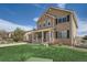 Charming two-story home with neutral siding, covered porch, and well-manicured lawn at 4206 Eagle Ridge Way, Castle Rock, CO 80104