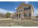 Charming two-story home featuring a covered porch and well-maintained landscaping at 4206 Eagle Ridge Way, Castle Rock, CO 80104