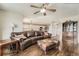 Open-concept living room with hardwood floors connecting to the kitchen at 4206 Eagle Ridge Way, Castle Rock, CO 80104