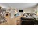 Spacious living room with comfortable seating, large TV, and stylish decor at 12286 W Tennessee, Lakewood, CO 80228