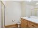 Clean bathroom featuring a shower and traditional vanity at 371 Buckskin Ct, Parker, CO 80138