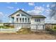 A beautiful house with a white exterior, multiple decks, and an attached two-car garage, perfect for Gathering living at 371 Buckskin Ct, Parker, CO 80138