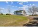 A charming two-story home with white picket fence and lush green lawn at 371 Buckskin Ct, Parker, CO 80138