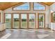 Bright living room featuring large windows offering stunning views of the surrounding landscape at 371 Buckskin Ct, Parker, CO 80138