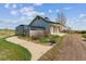 A three-car detached garage with a greenhouse at 371 Buckskin Ct, Parker, CO 80138