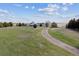 Expansive property with a long driveway leading to the main house at 371 Buckskin Ct, Parker, CO 80138