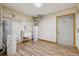 Functional utility room with water heater and sink at 371 Buckskin Ct, Parker, CO 80138