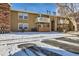 Rear view of condo building showing individual unit entrance at 10251 W 44Th Ave # 102, Wheat Ridge, CO 80033