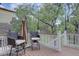 Relax on the deck with comfortable seating and enjoy the view with outdoor chairs and a white railing at 24556 E Ottawa Ave, Aurora, CO 80016