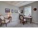 Home office with neutral walls, a large window, and comfortable seating at 24556 E Ottawa Ave, Aurora, CO 80016