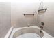 Clean bathroom with a tub and shower at 4206 S Granby St # E, Aurora, CO 80014