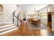 Elegant dining area with hardwood floors and staircase at 355 Steele St, Denver, CO 80206