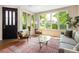Inviting living room with ample natural light and stylish decor, perfect for relaxation and entertaining at 355 Steele St, Denver, CO 80206