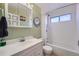 Clean bathroom with shower/tub combo and updated vanity at 8604 Barberry Pl, Parker, CO 80134