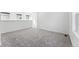 Upstairs hallway area with carpet flooring and lots of natural light at 2070 Wagon Wheel Aly, Brighton, CO 80601