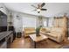 Comfortable living room with stylish furnishings, hardwood floors, and ample natural light at 7624 Navajo St, Denver, CO 80221