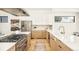 Bright kitchen with modern appliances, sleek countertops, and stylish cabinetry, offering a functional and elegant cooking space at 4398 N Pecos St, Denver, CO 80211