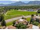 Stunning aerial view of home with mountain backdrop, near a lush green park and school, offering scenic living at 4717 Tantra Dr # G5, Boulder, CO 80305