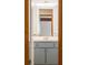 Bright bathroom featuring neutral colors, a vanity, and framed mirror at 4717 Tantra Dr # G5, Boulder, CO 80305