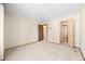 Spacious bedroom with carpet, closet, and an adjacent en suite bathroom at 4717 Tantra Dr # G5, Boulder, CO 80305