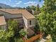 Charming condo with a cozy, fenced-in front yard and mature trees, offering a tranquil setting at 4717 Tantra Dr # G5, Boulder, CO 80305