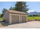 Detached two-car garage with a concrete driveway and landscaping at 4717 Tantra Dr # G5, Boulder, CO 80305