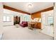 Cozy living room featuring a wood-burning stove, comfortable seating, and abundant natural light at 4717 Tantra Dr # G5, Boulder, CO 80305