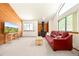 Inviting living room with a charming wood stove, plush seating, and a bright, airy atmosphere at 4717 Tantra Dr # G5, Boulder, CO 80305