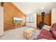 Comfortable living room with a wood stove, contemporary decor, and abundant natural light at 4717 Tantra Dr # G5, Boulder, CO 80305
