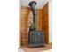 Close-up of a stylish wood-burning stove, adding warmth and character to the living space at 4717 Tantra Dr # G5, Boulder, CO 80305