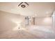 Versatile basement space with carpet, recessed lighting, and ample room for customization at 17949 E Ohio Cir, Aurora, CO 80017
