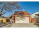 Charming single-Gathering home with a two-car garage, manicured front yard, and inviting curb appeal at 17949 E Ohio Cir, Aurora, CO 80017