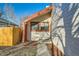 Side view of a home with a brick path leading to the front door at 17949 E Ohio Cir, Aurora, CO 80017