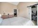 Bedroom featuring a closet with a barn door and neutral color palette at 804 Summer Dr, Highlands Ranch, CO 80126