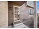 Inviting entryway with a charming screen door and visible house number at 804 Summer Dr, Highlands Ranch, CO 80126